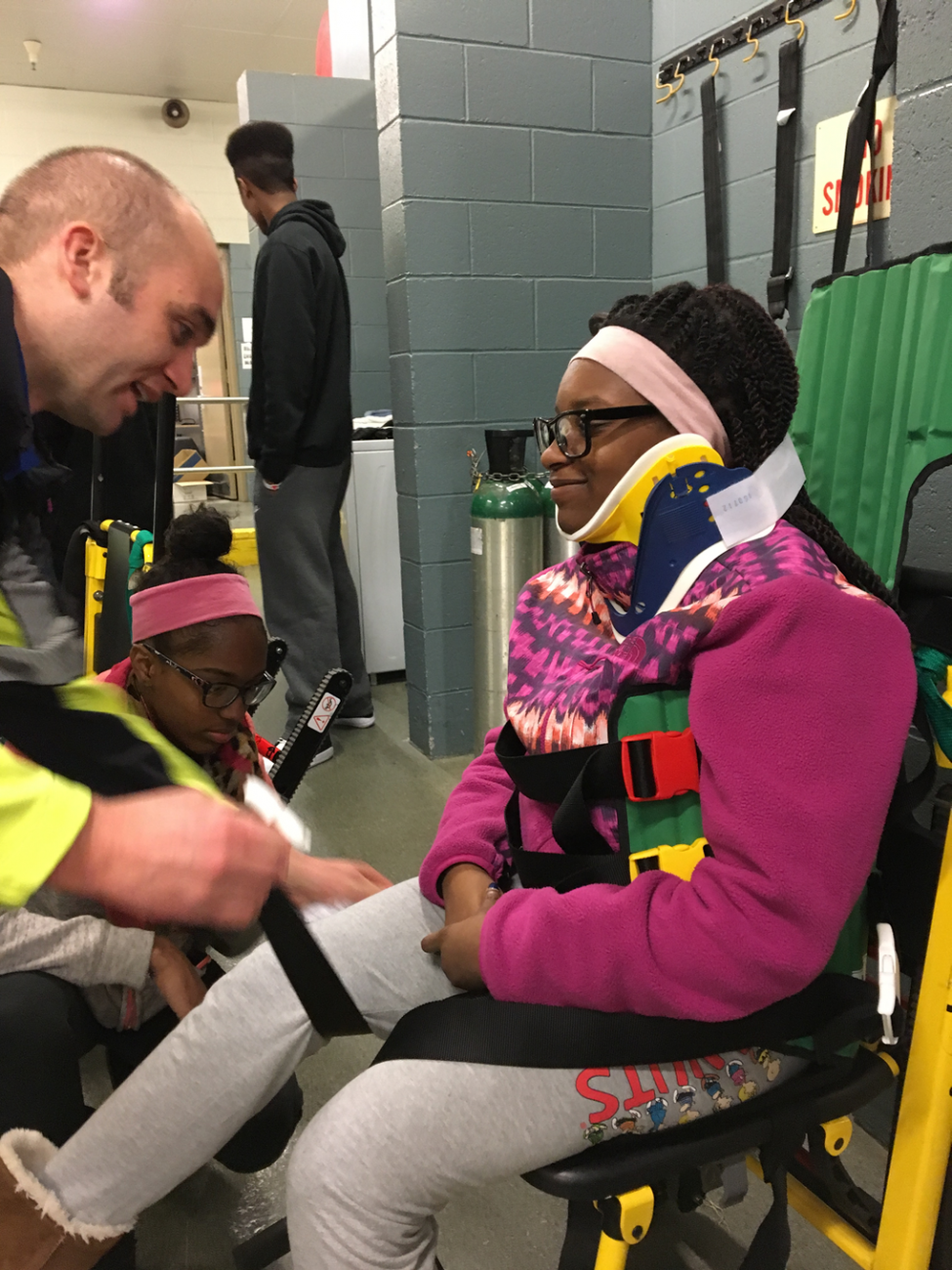 Paramedic Hardison demonstrating proper use immobilization device.