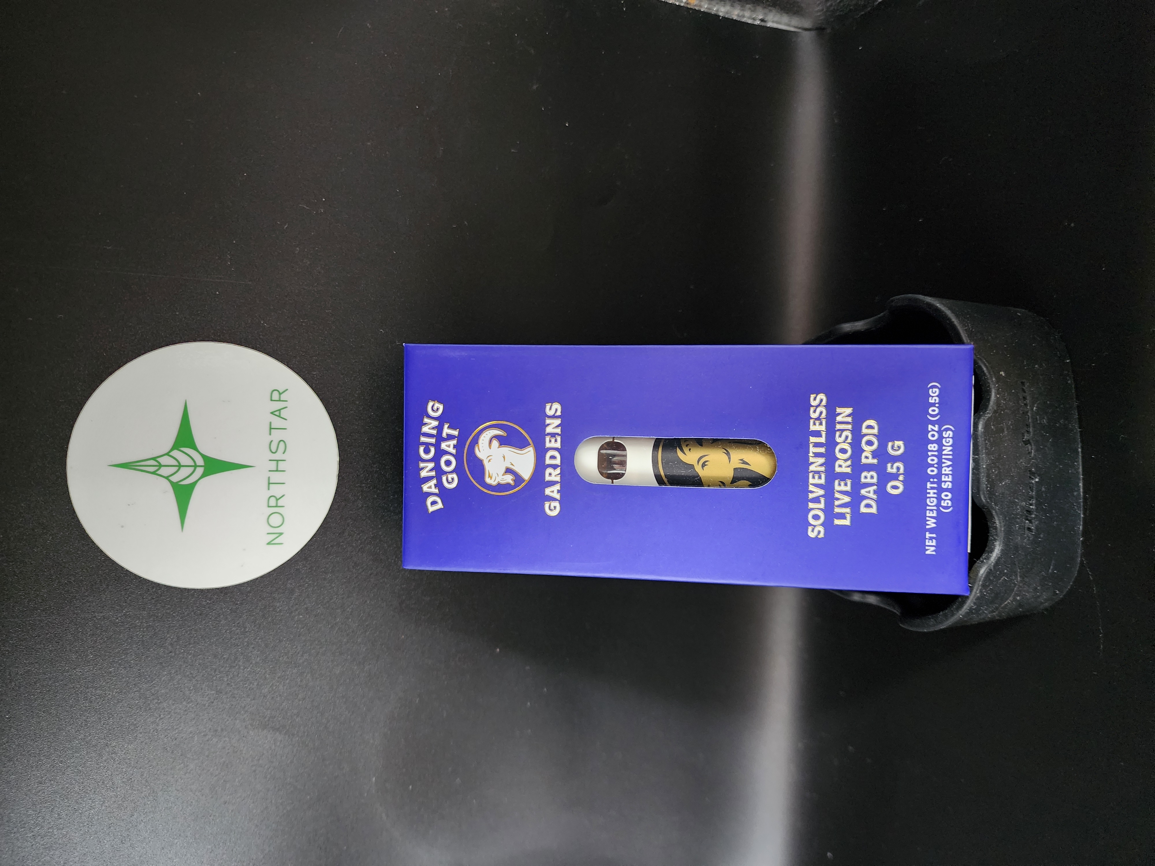 Photograph of product: .5 Rosin Disposable - Sour Papaya - Dancing Goat Gardens