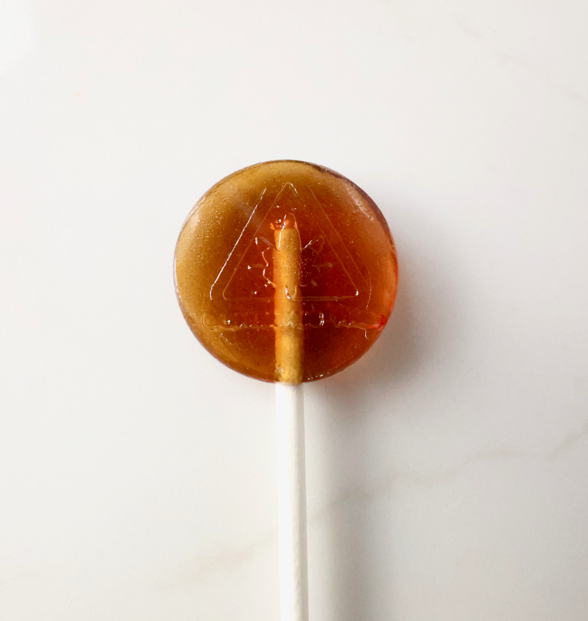 Photograph of product: Zenia - Root Beer Lollipop (10mg)