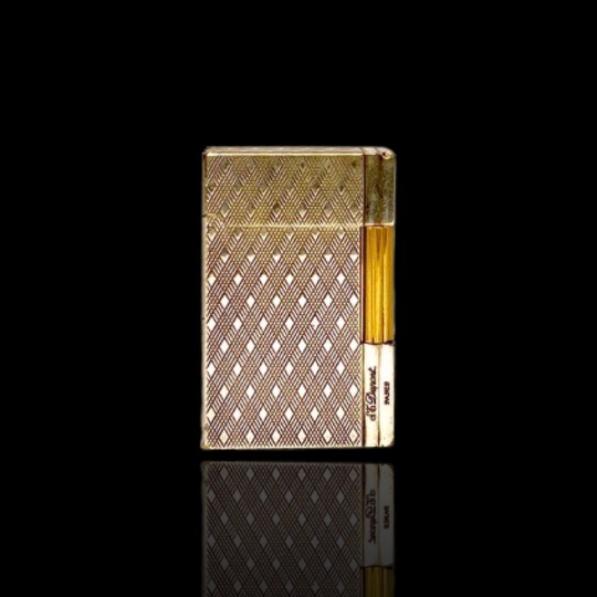 Photograph of product: Vintage Silver & Gold Lighter by St. Dupont