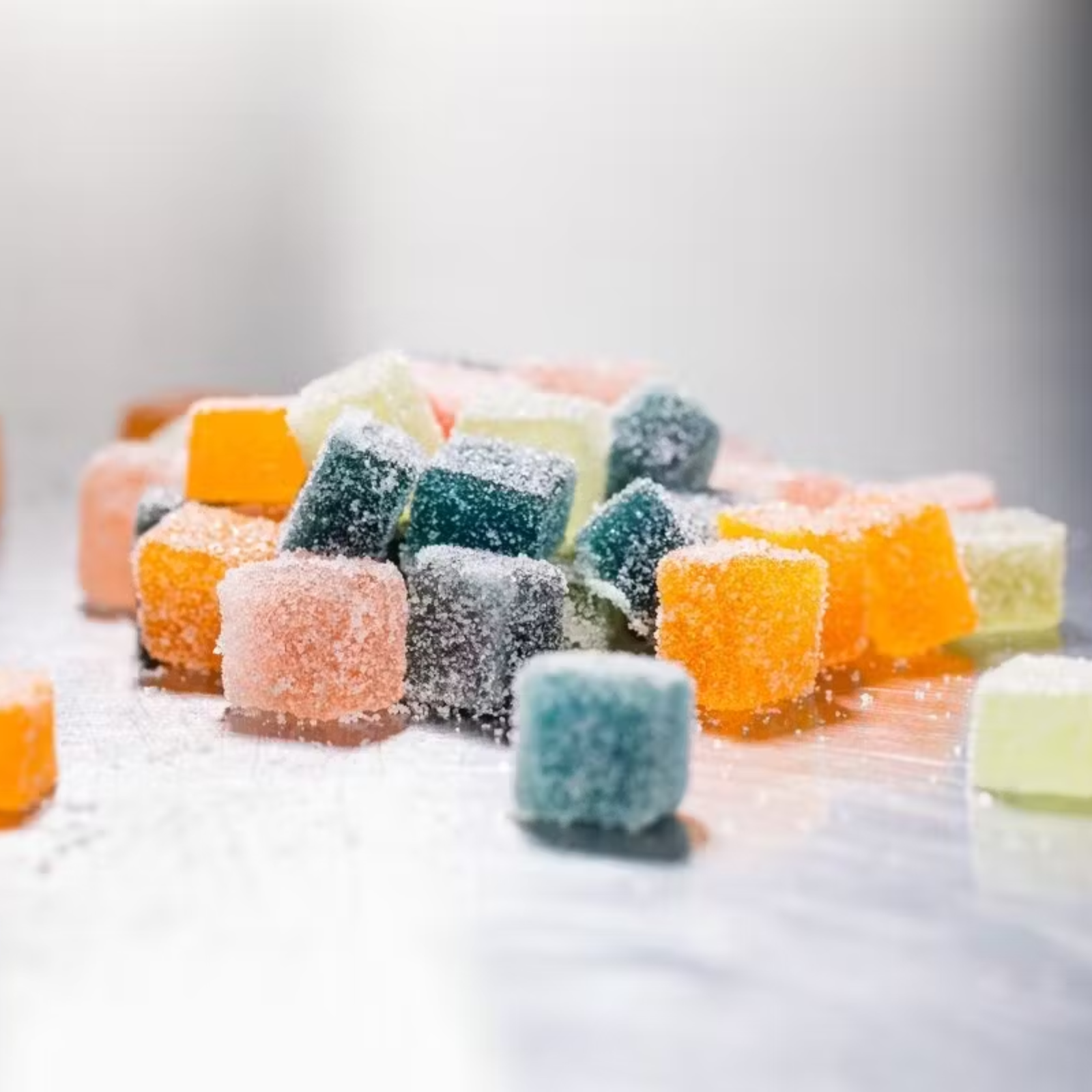 Photograph of product: 100mg Gummies | Watermelon Cubes | The Heirloom Collective