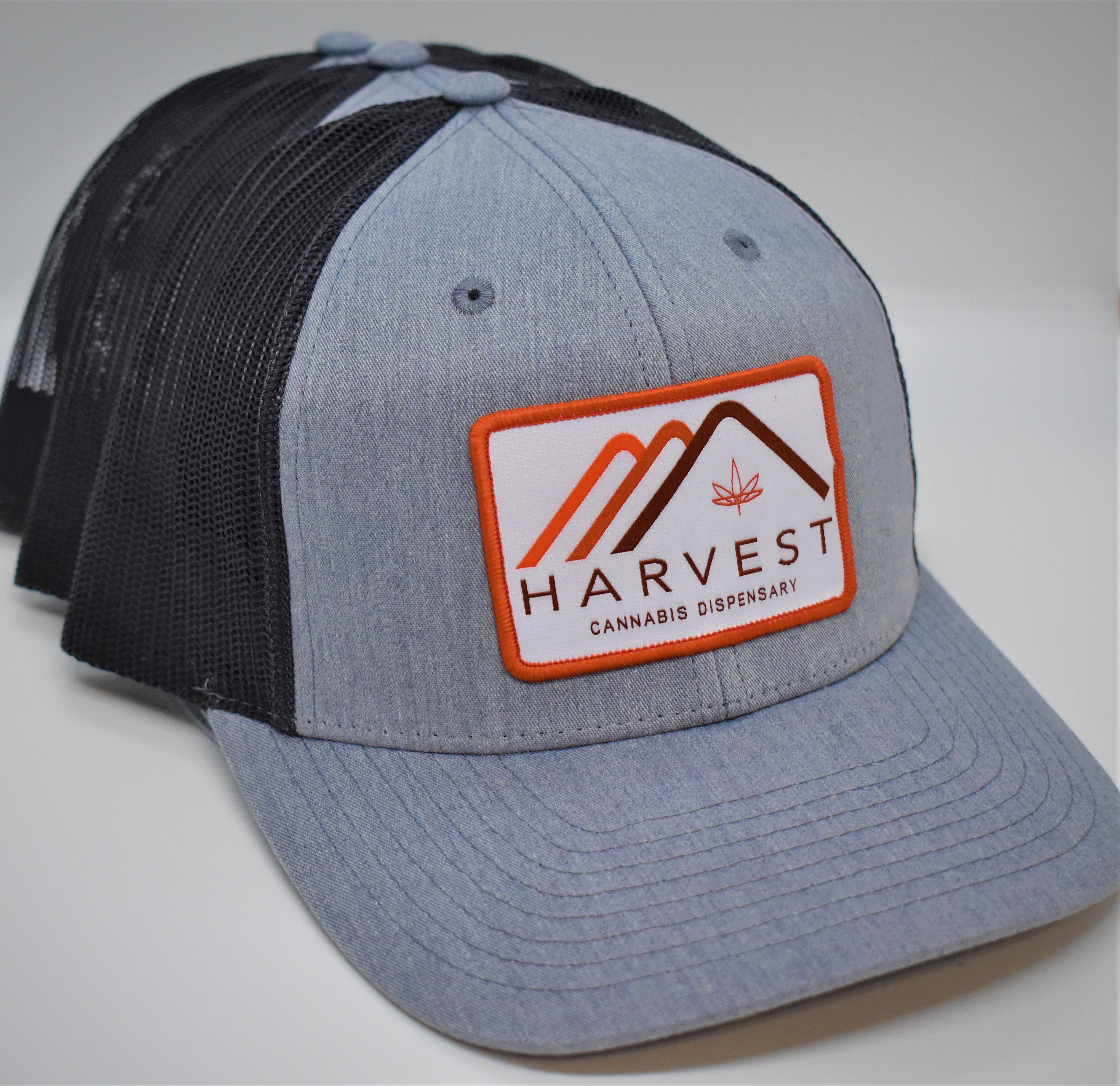 Photograph of product: Harvest - Hat - Black/Grey/Mountain Logo