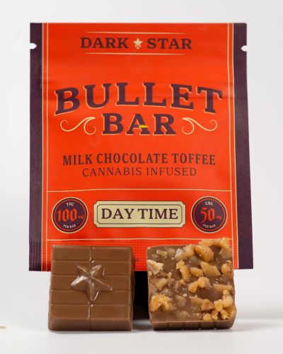 Photograph of product: Calamity Jane - BullCalamity Jane - Bullet Bar - Day Time - Milk Chocolate Toffee - 2:1 TH-oui:CBG - 100mgt - Milk Chocolate Toffee - 2:1 TH-oui:CBG - 100mg