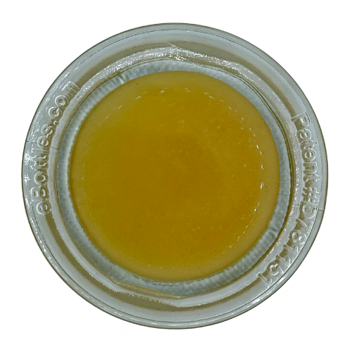 Photograph of product: Cannalicious Colombian Gold Oui'd Wax Baller Jar 7g