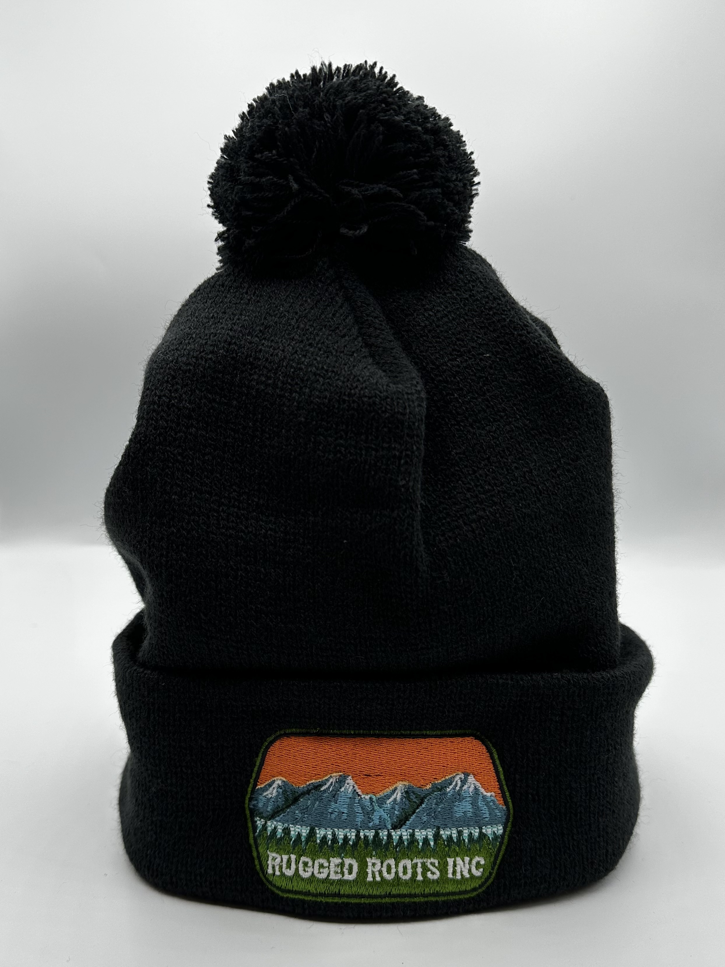 Photograph of product: Rugged Roots | Black Beanie Pom Pom