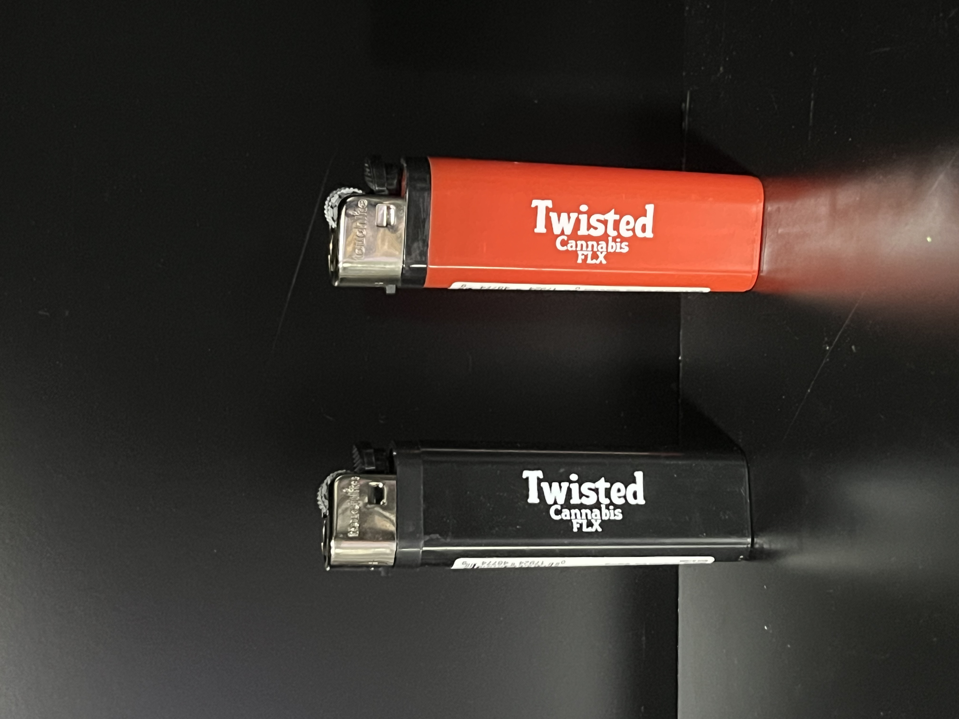Photograph of product: Twisted Oui'd FLX Logo Lighter