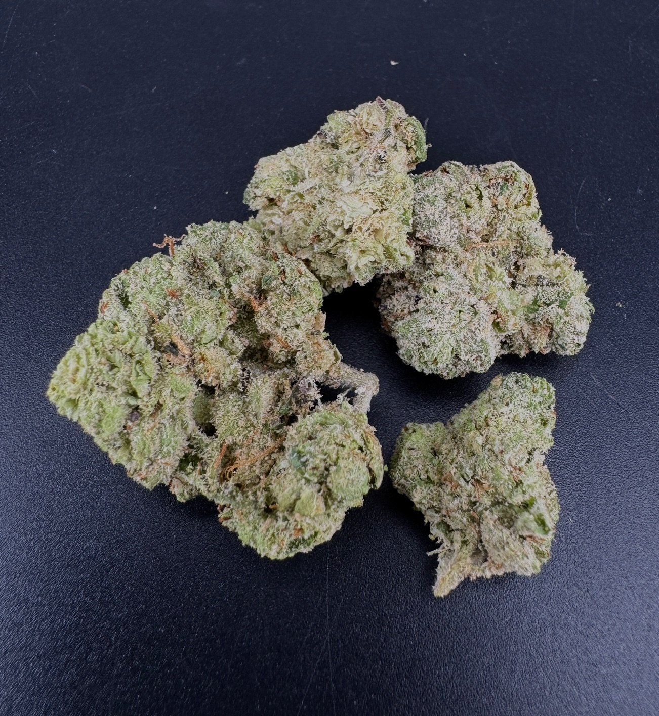 Photograph of product: White Runtz Flower | Smalls | Hybrid | Purple Co. - 28g