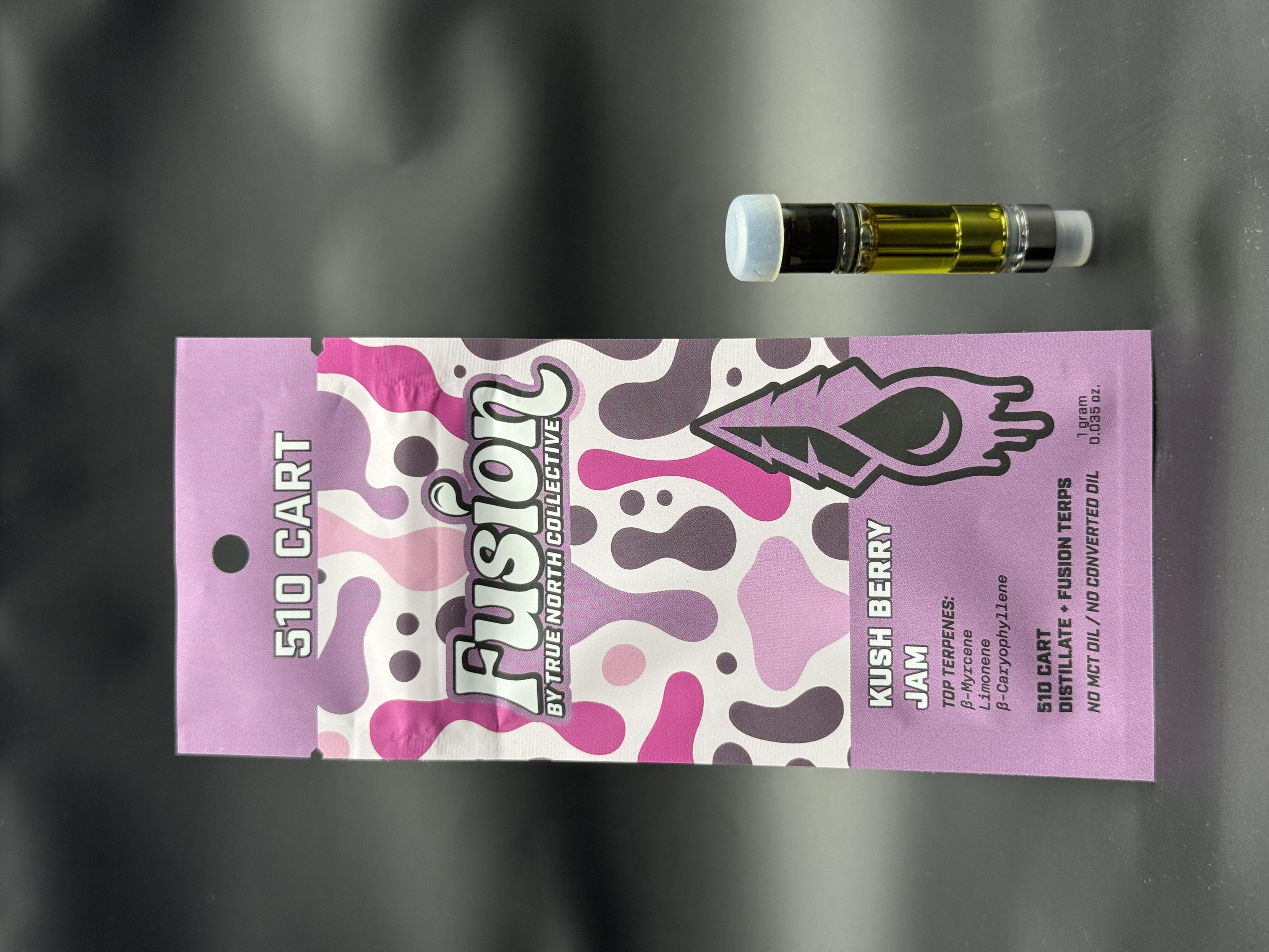 Photograph of product: Fusion by True North Distillate Vape Cartridge - Kushberry Jam