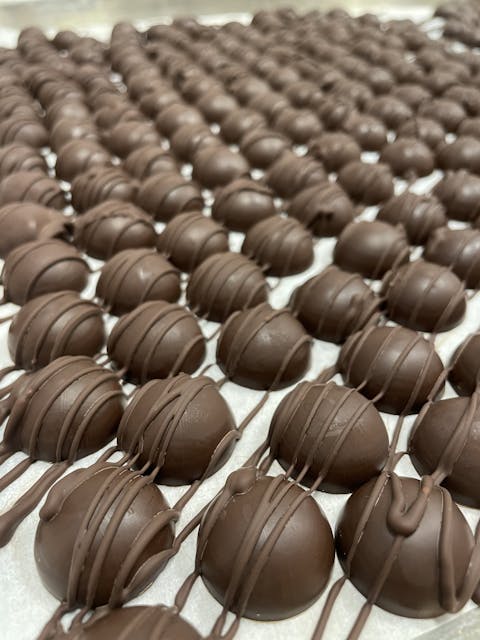 Photograph of product: Milk Chocolate Bon Bons 100mg - Chocolate