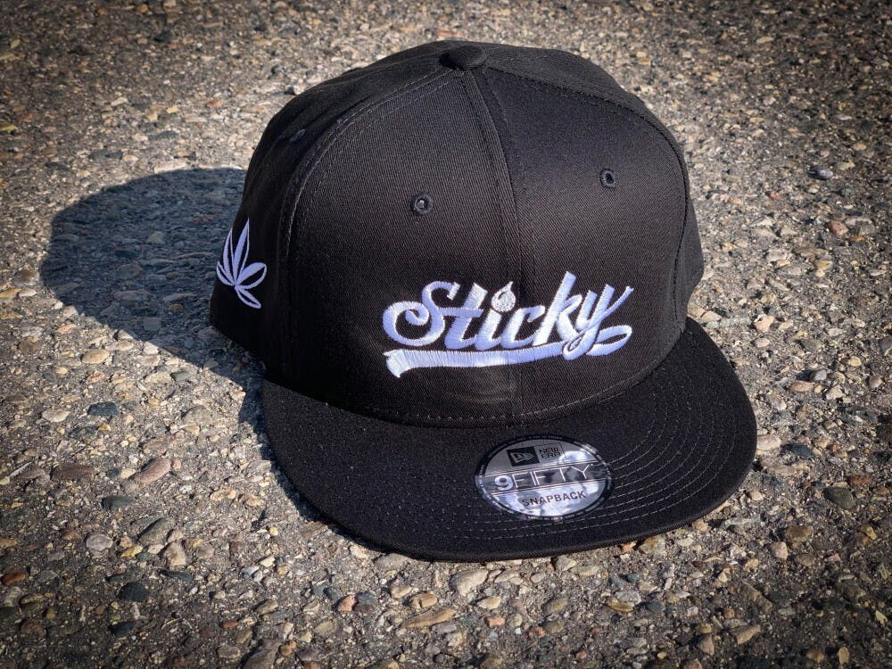 Photograph of product: Sticky Black Snap Back Hat