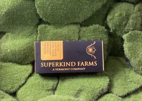 Photograph of product: Distillate Vape Cart | Zkittles Glue | Superkind Farms
