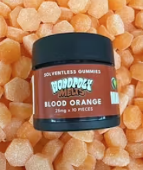 Photograph of product: Monopoly Melts - Blood Orange - Live Rosin Gummies - 250mg TH-oui 10pcs. - Illicit