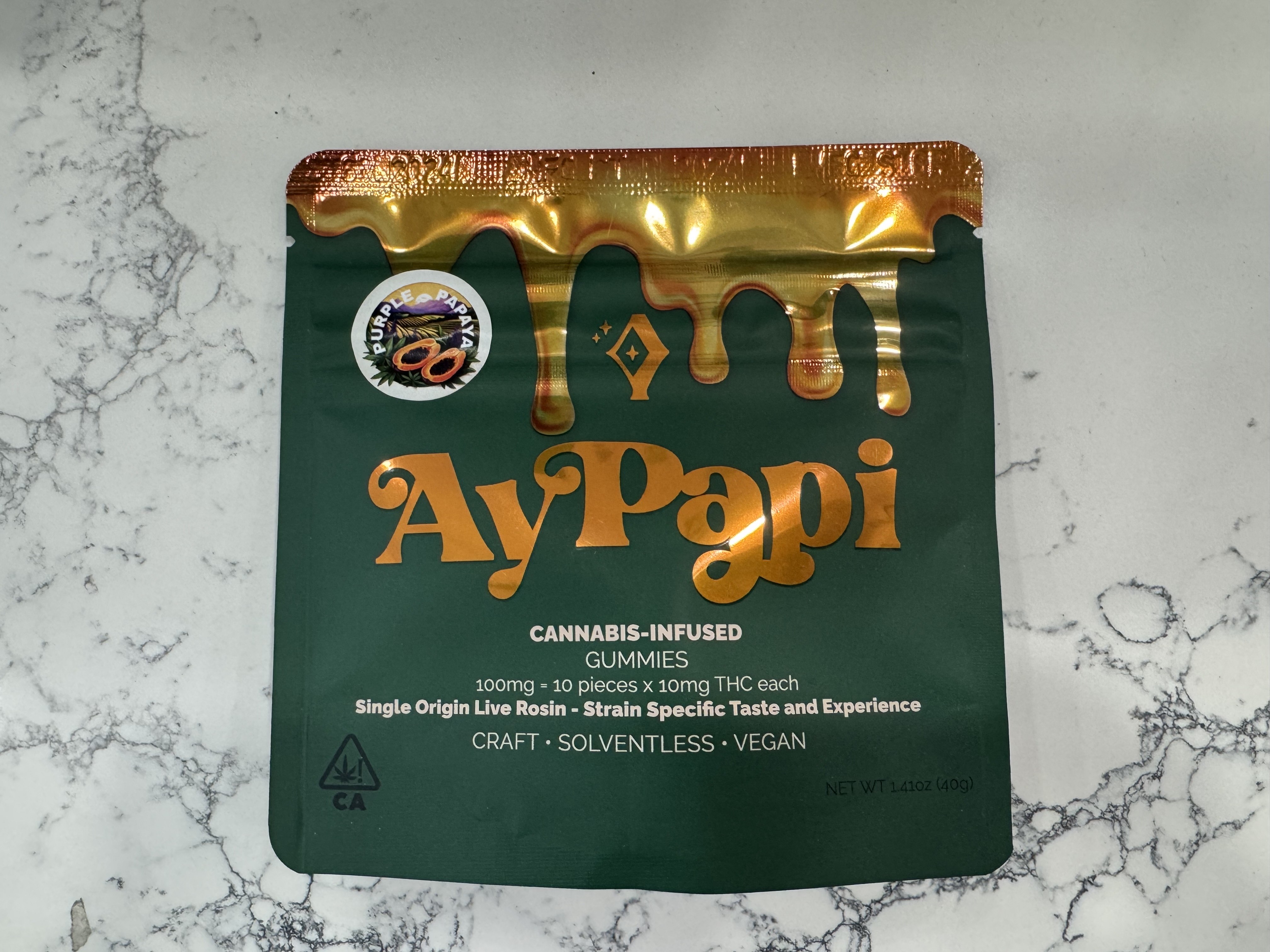 Photograph of product: Ay Papi Edibles Purple Papaya 100MG