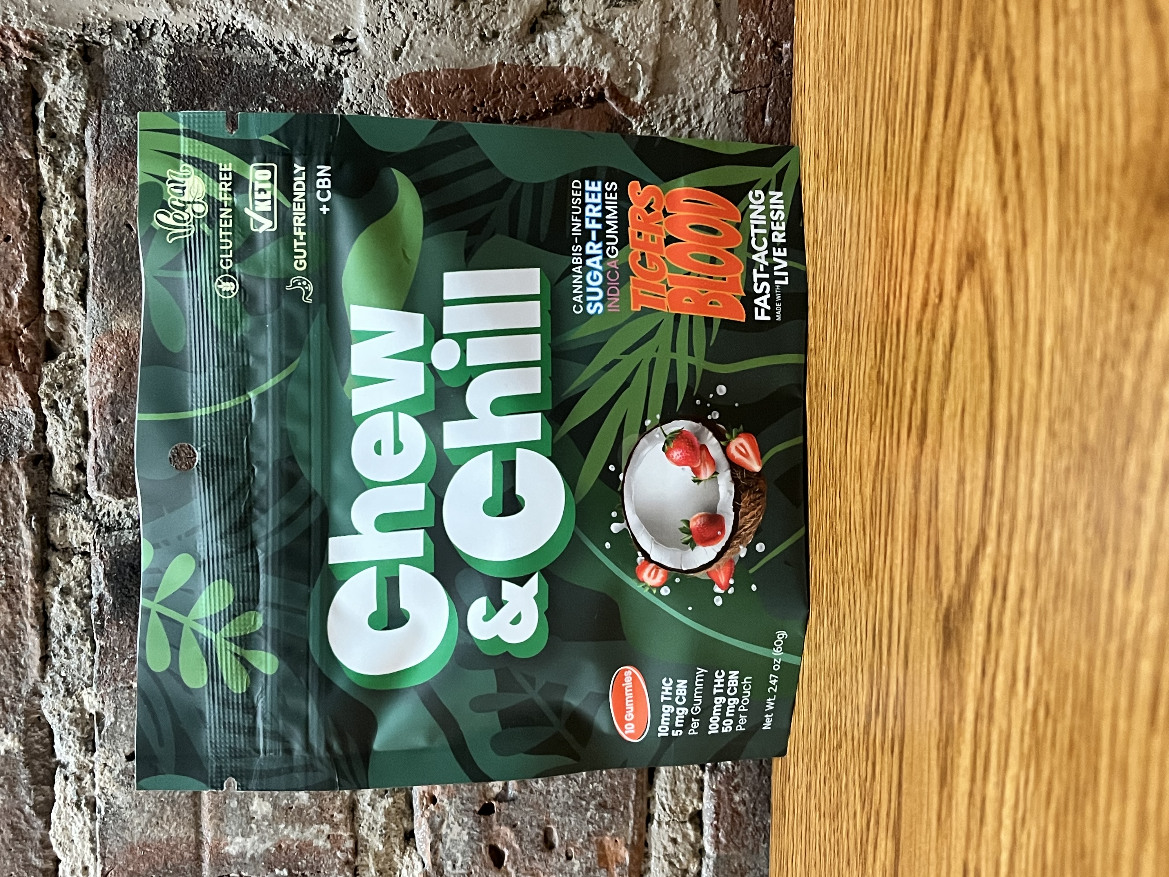 Photograph of product: CHEW & CHEW - TIGER BLOOD STRAWBERRY COCONUT GUMMIES - 100MG