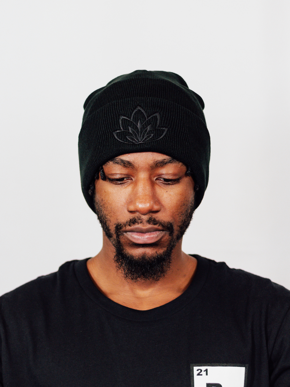 Photograph of product: 3D Embroidered Lotus Black and White Beanie | 5,000 Points