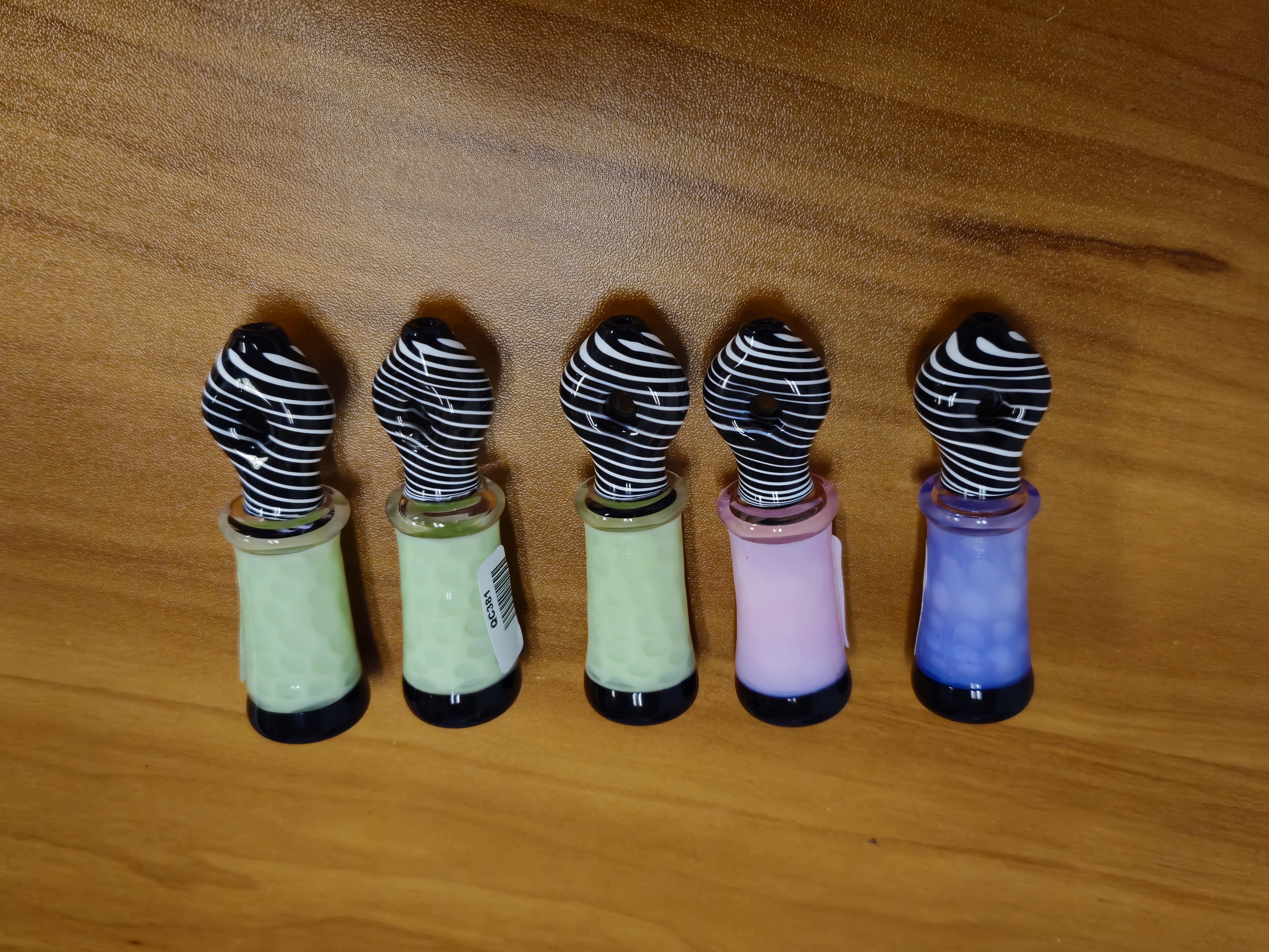 Photograph of product: Smoke Nation - Pastel Honeycomb Tube w/ Striped Mouth - One Hitter