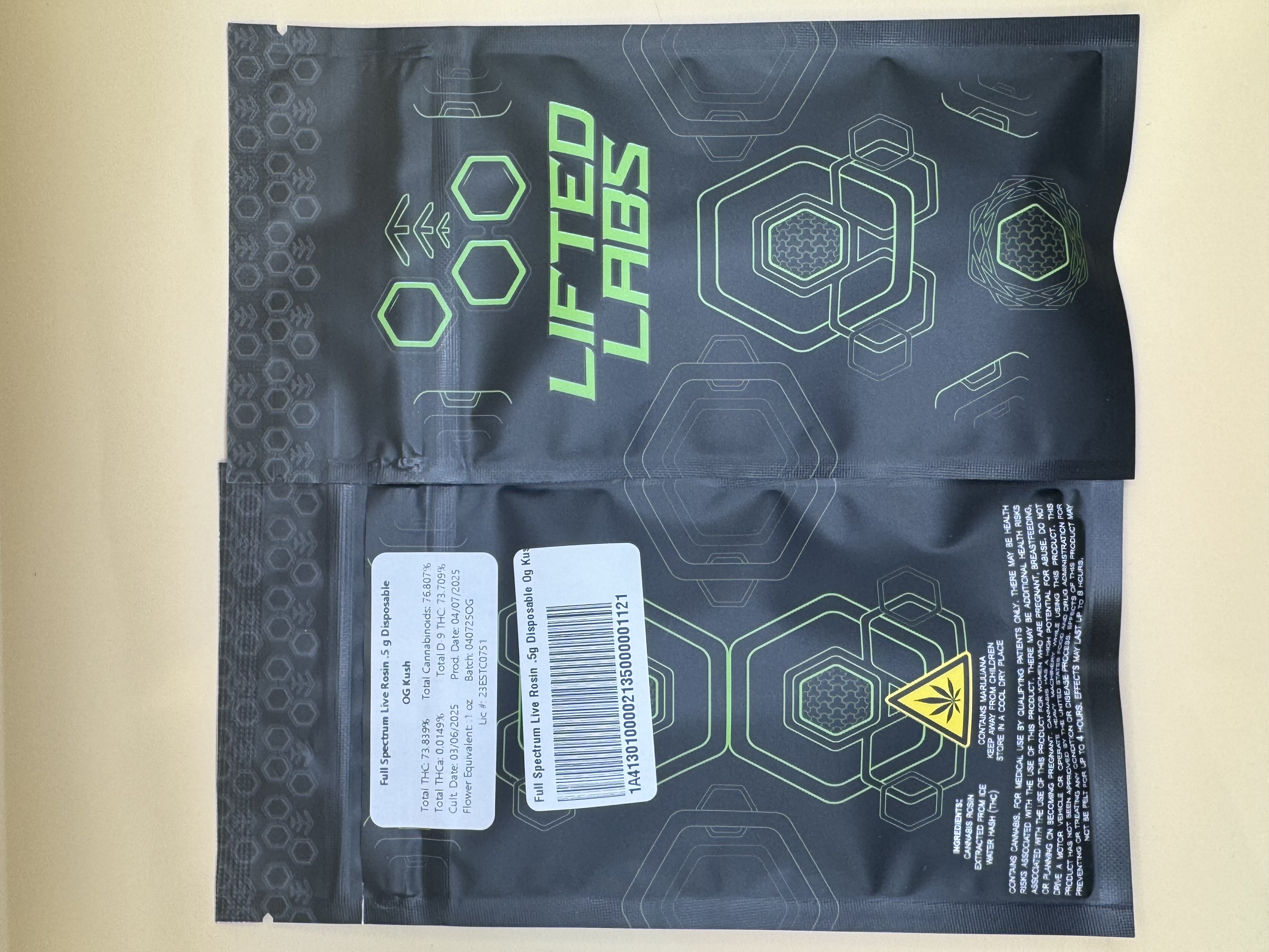 Photograph of product: Lifted Labs OG Kush Full Spectrum Disposable Live Rosin Cart 0.5g