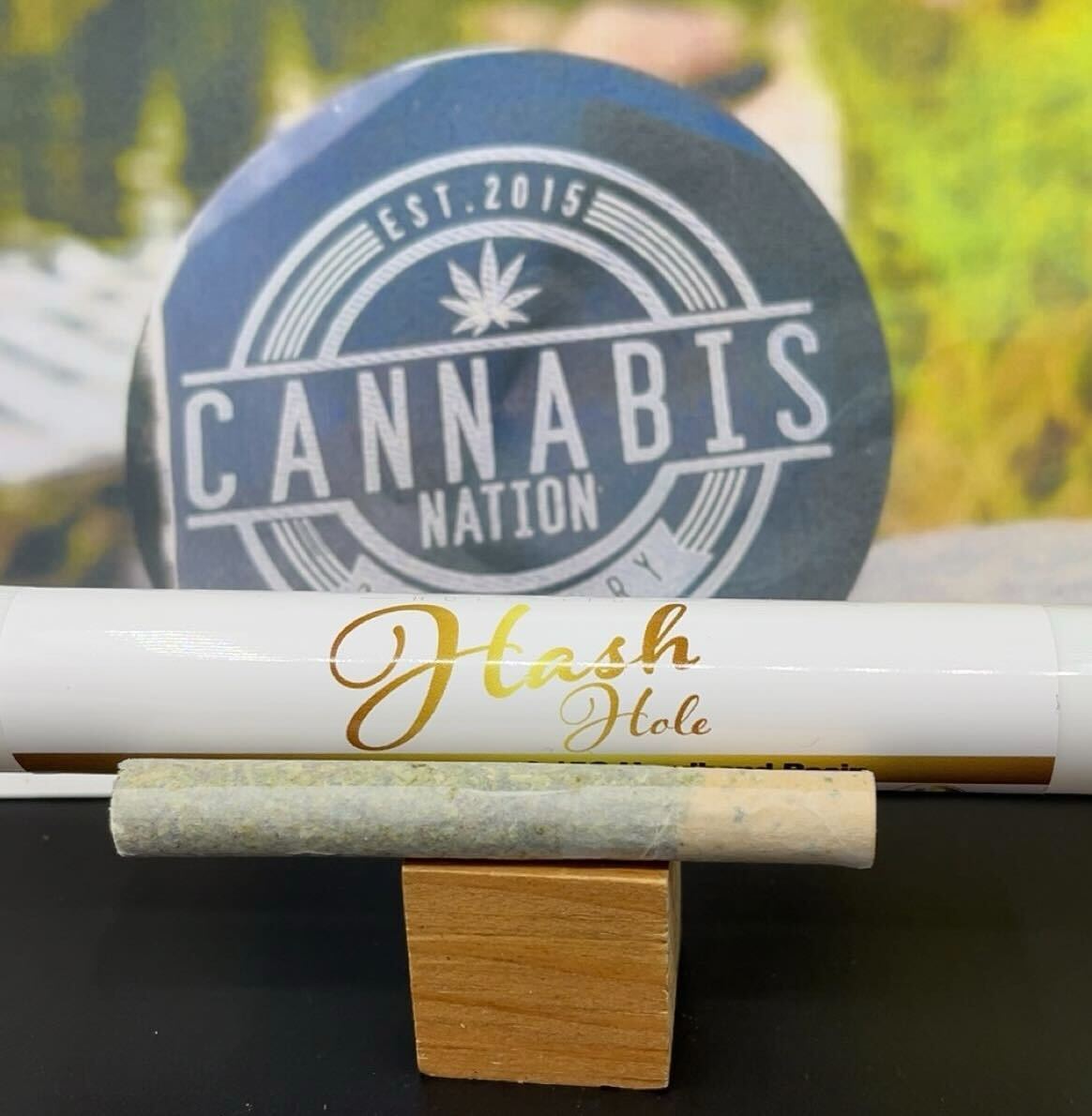 Photograph of product: au chocolat Hole Infused Pre-Roll | True Glue Flower + Headbands Rosin | 1.2g