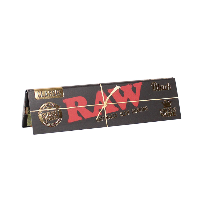 Photograph of product: RAW BLACK Classic King Size Slim Rolling Paper | 32ct