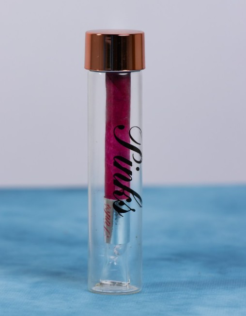 Photograph of product: Afghan Skunk + Purple Mac | Infused Rosa Petal Pre-roll | 2g