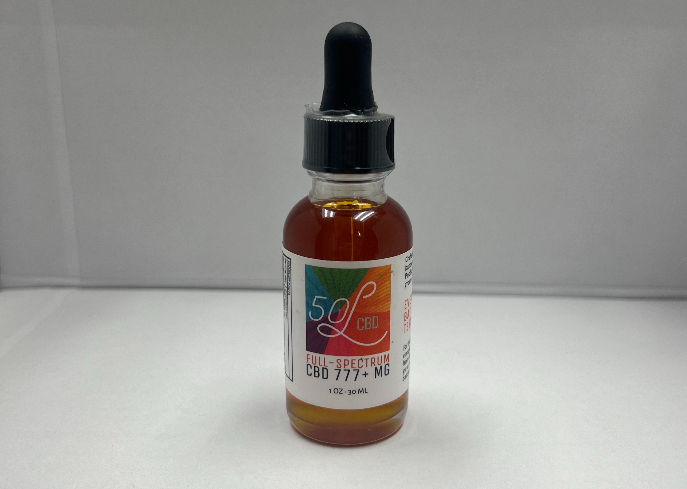 Photograph of product: Full Spectrum Oui'd 777mg | Tincture 30ml