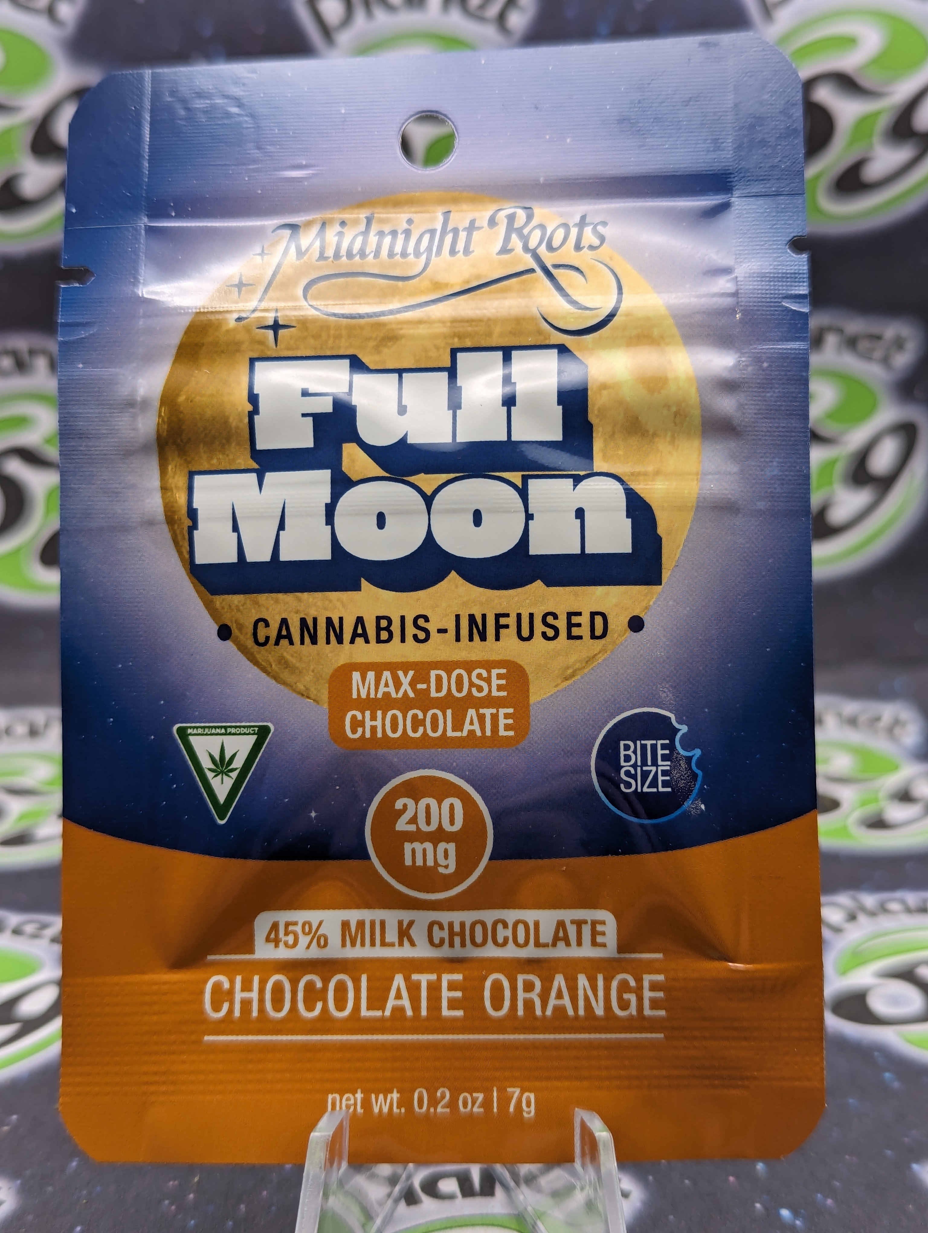Photograph of product: Midnight Roots | Orange Milk Chocolate | 200mg Bite-Sized Chocolate