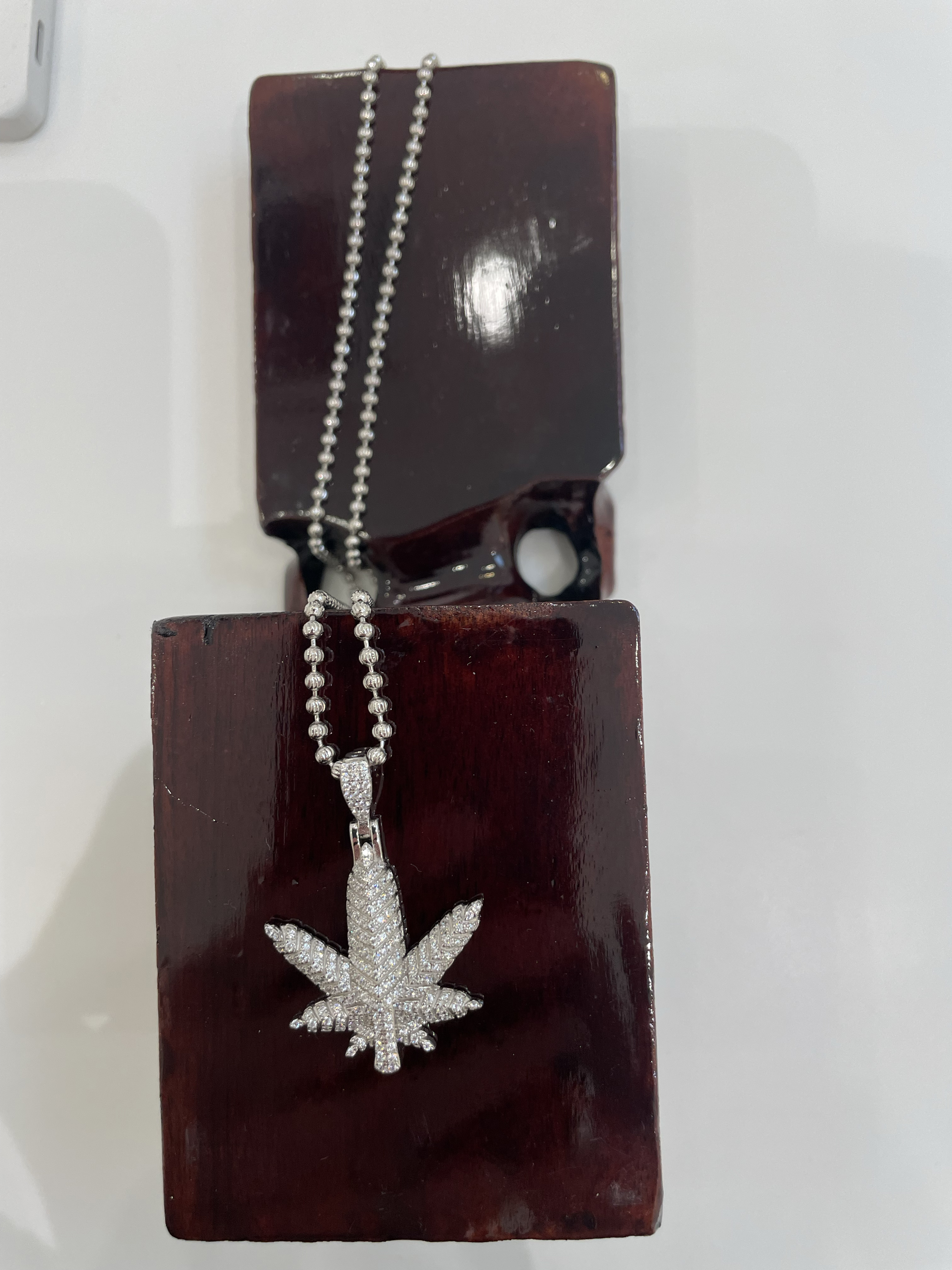 Photograph of product: Brooklyn or Bust | Happy Leaf Charm | Silver