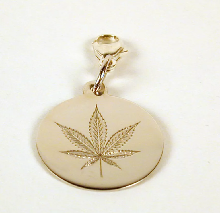 Photograph of product: Oui'd Leaf Charm | Sterling Silver Engraved Oui'd