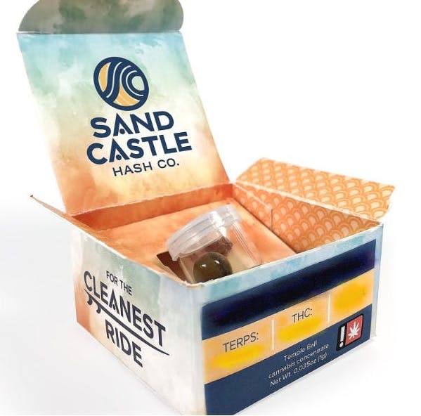 Photograph of product: Strawberry Cough - au chocolat Temple Ball - Sand Castle