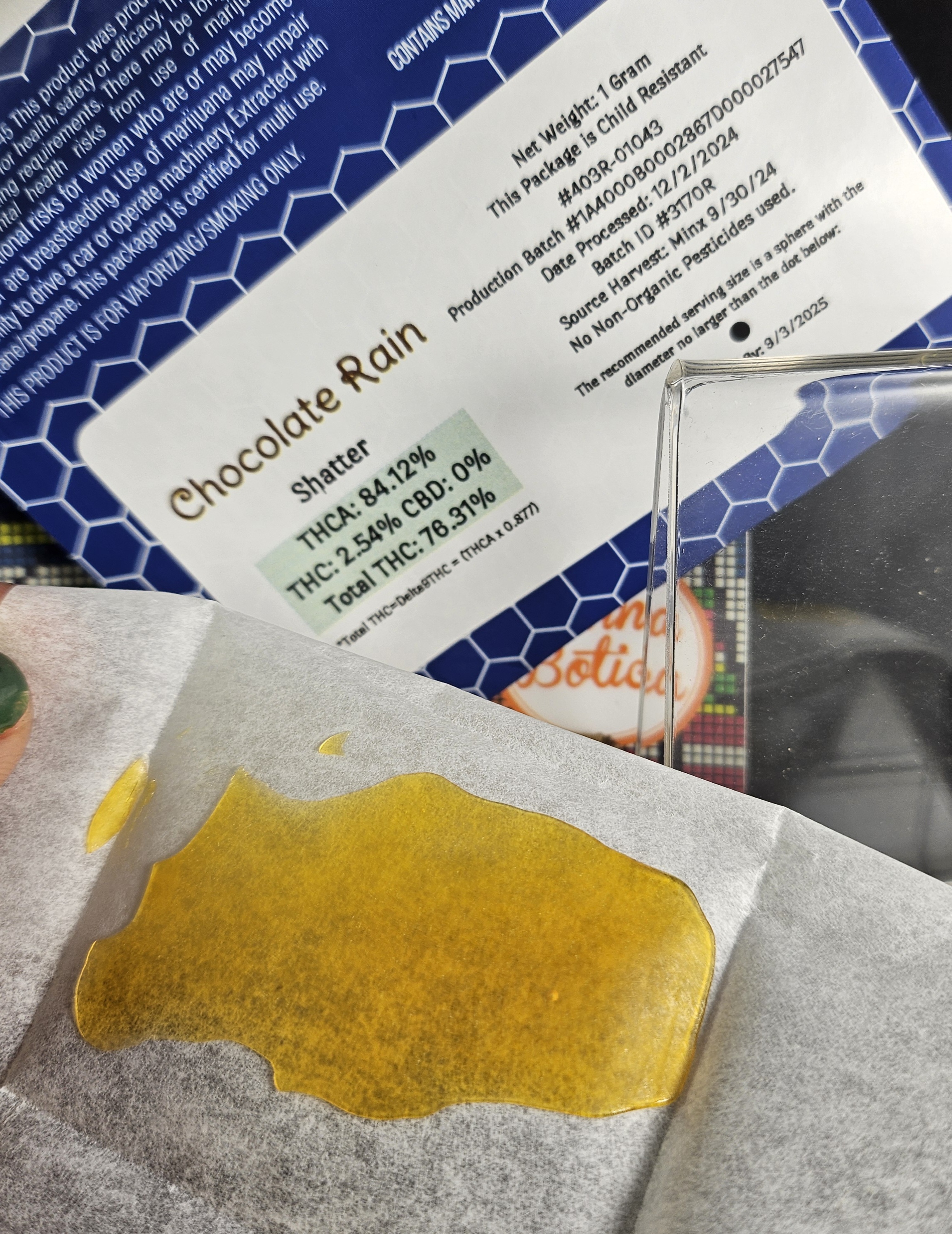 Photograph of product: Co. Best Dabs Shatter Chocolate Rain