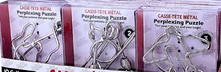 Photograph of product: Puzzle- Metal Brain Teaser- Assorted sizes and shapes - 