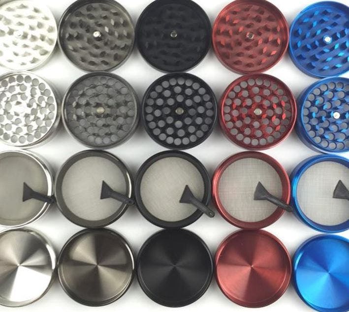 Photograph of product: Luvbuds 50mm Zinc 4 Piece Grinder | Assorted Colors
