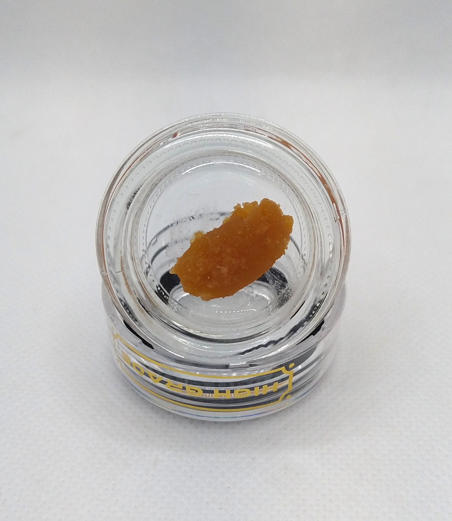 Photograph of product: High Grade | Citrus Surge | Live Resin Applesauce Concentrate Sativa