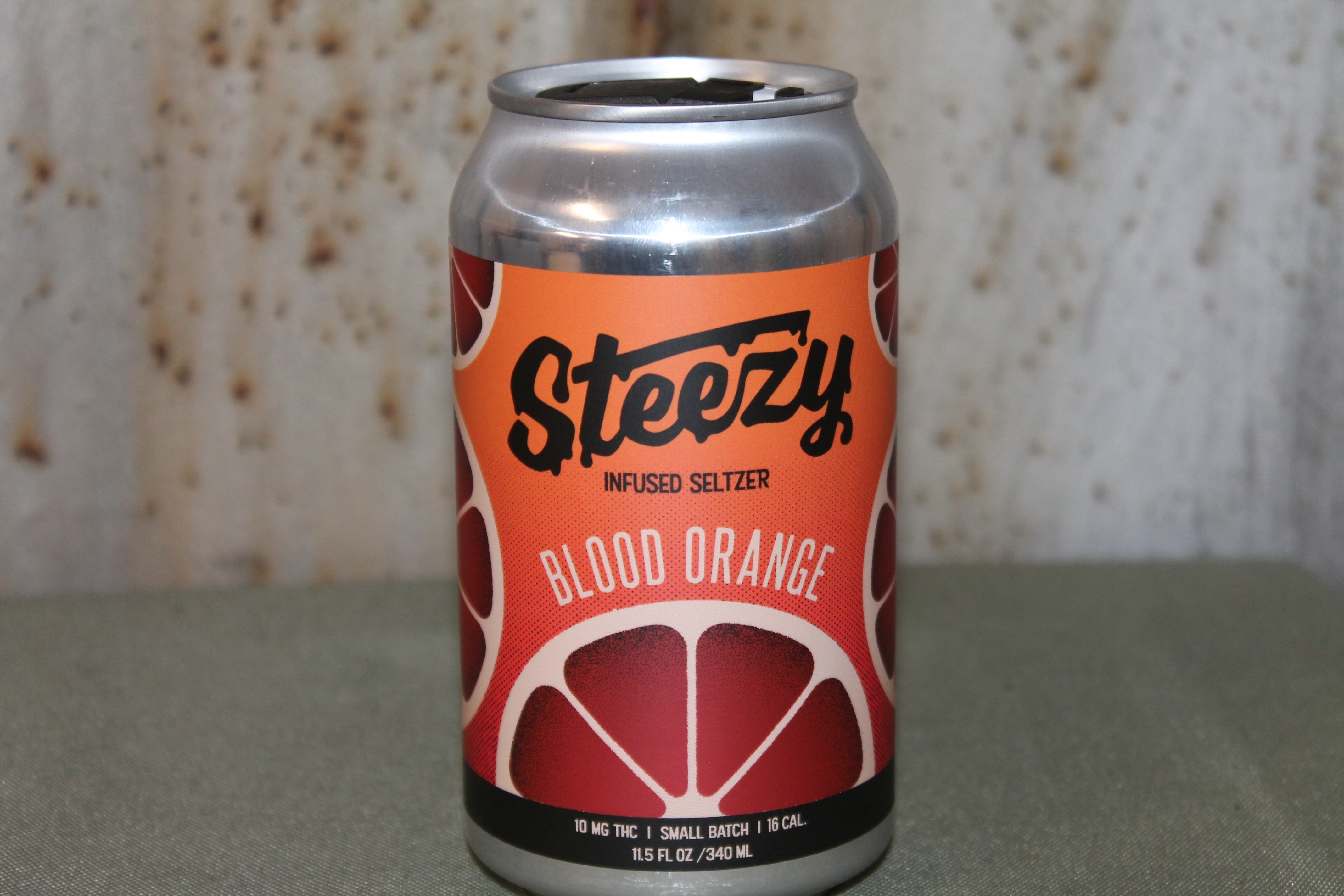 Photograph of product: Clean Oui'd I Steezy Blood Orange Seltzer