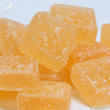Photograph of product: ECG 100mg Gummies | Orange Mango