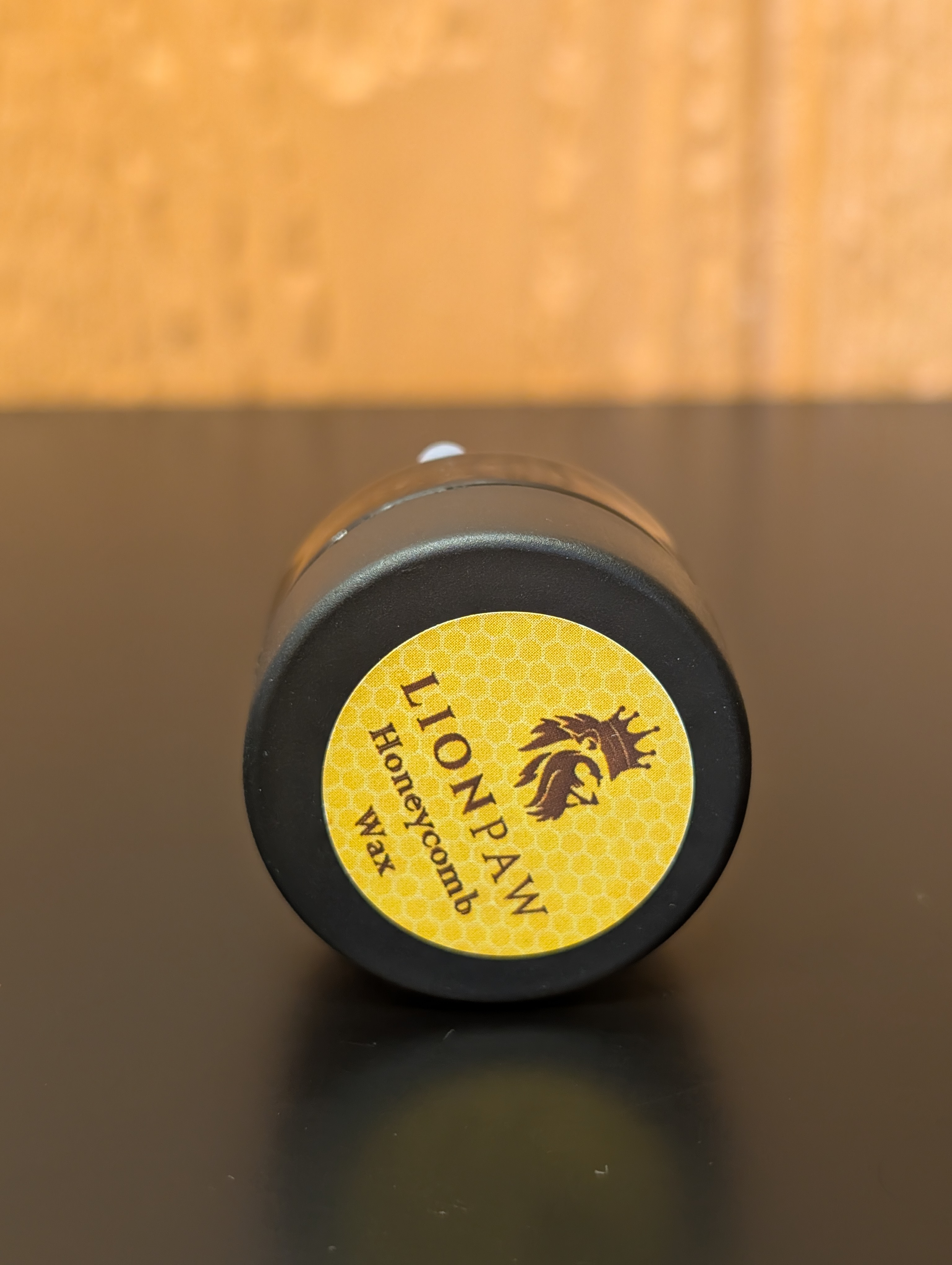 Photograph of product: Lions Paw | Honey child wax