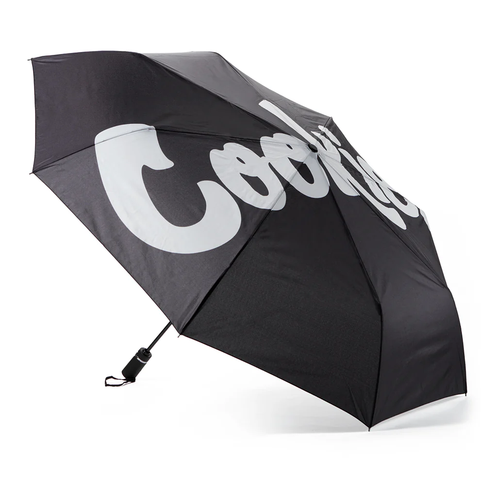 Photograph of product: COOKIES ORIGINAL MINT REPEATED PRINTED LOGO POLYESTER UMBRELLA (39"L X 51" W)  - BLACK ONE LOGO