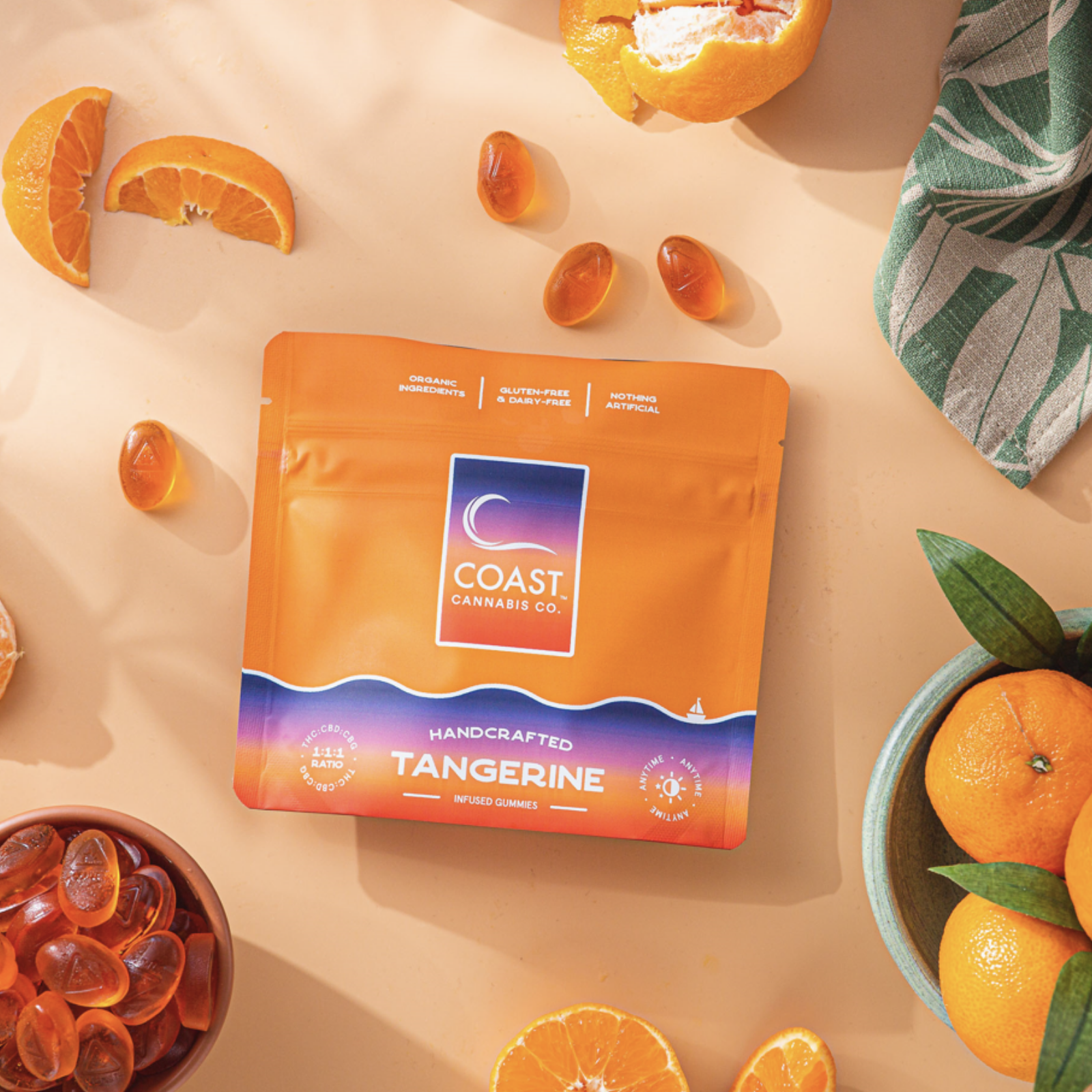 Photograph of product: 100mg Gummies | 1:1:1 Tangerine | Coast Oui'd