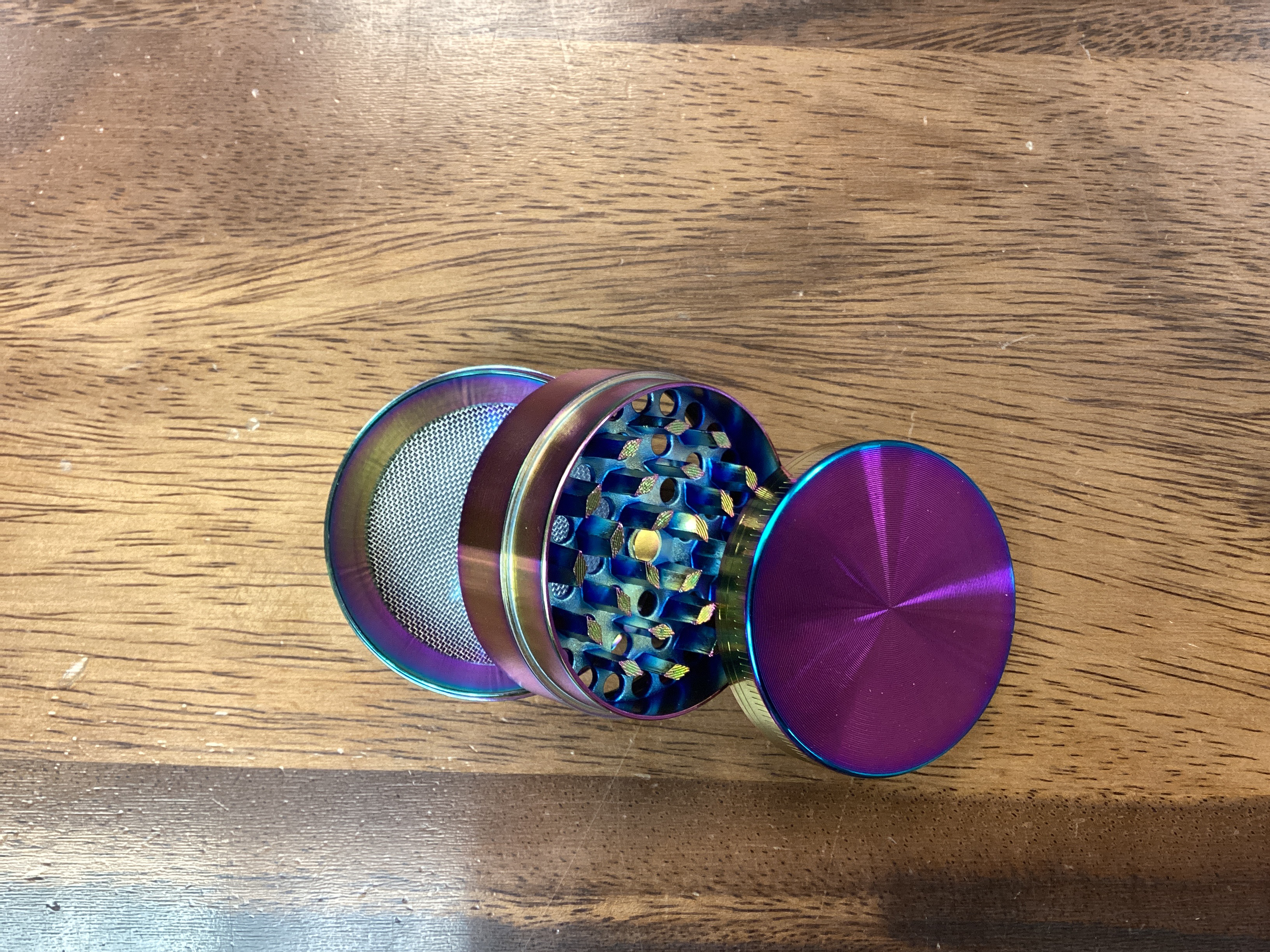 Photograph of product: Irredescent 4 part grinder