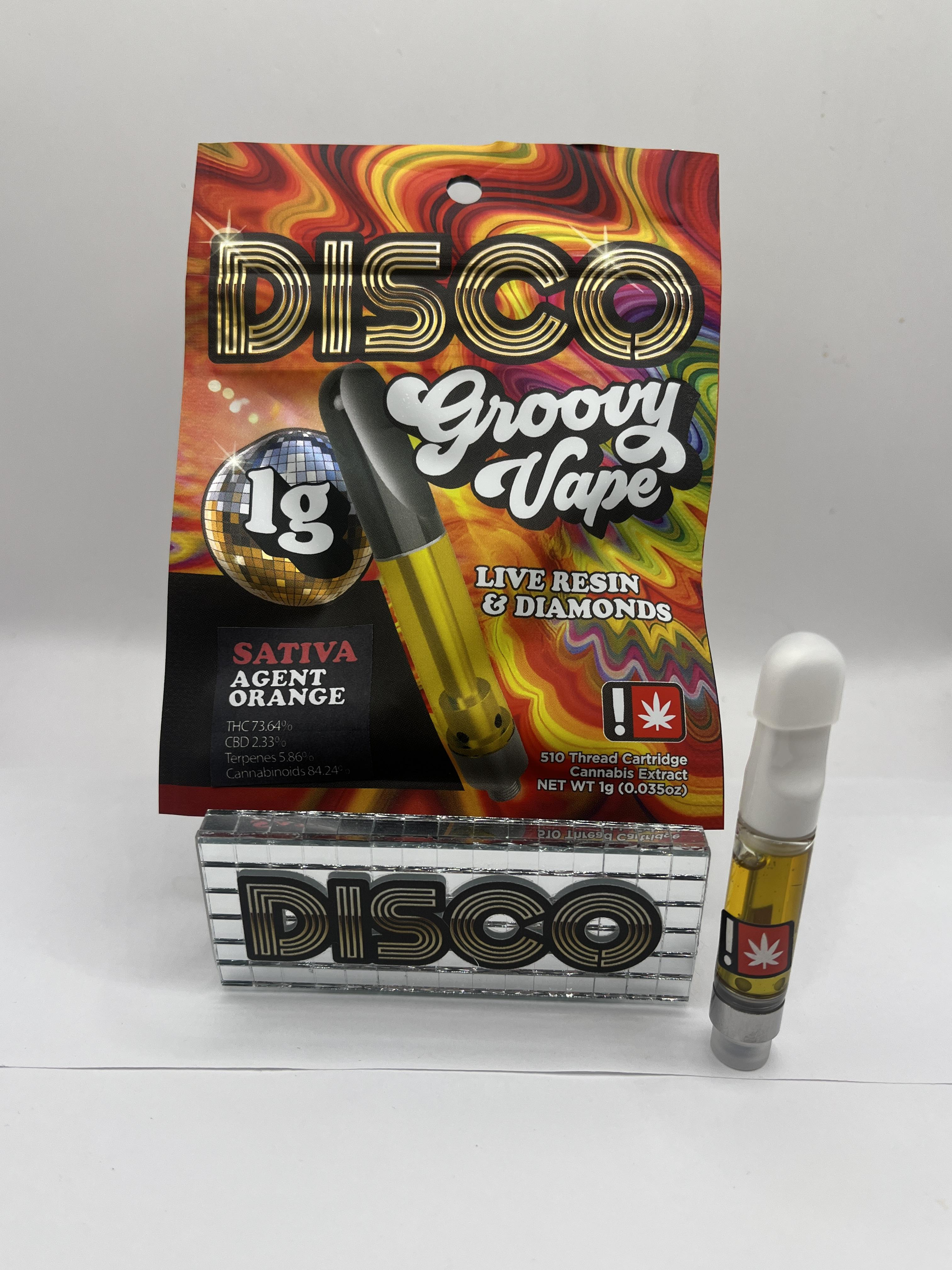 Photograph of product: Cartridge - Disco Dabs - 1g Diamond & Sauce - Agent Orange - GREEN LEAF SPECIAL