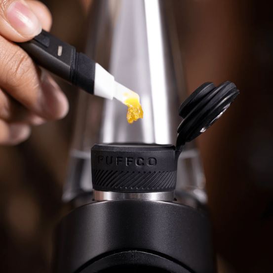 Photograph of product: PuffCo - Heated Loading Tool - Paradise Green