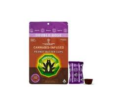 Photograph of product: Emerald Sky Oui'd Milk Chocolate Peanut Butter Cups 10pk