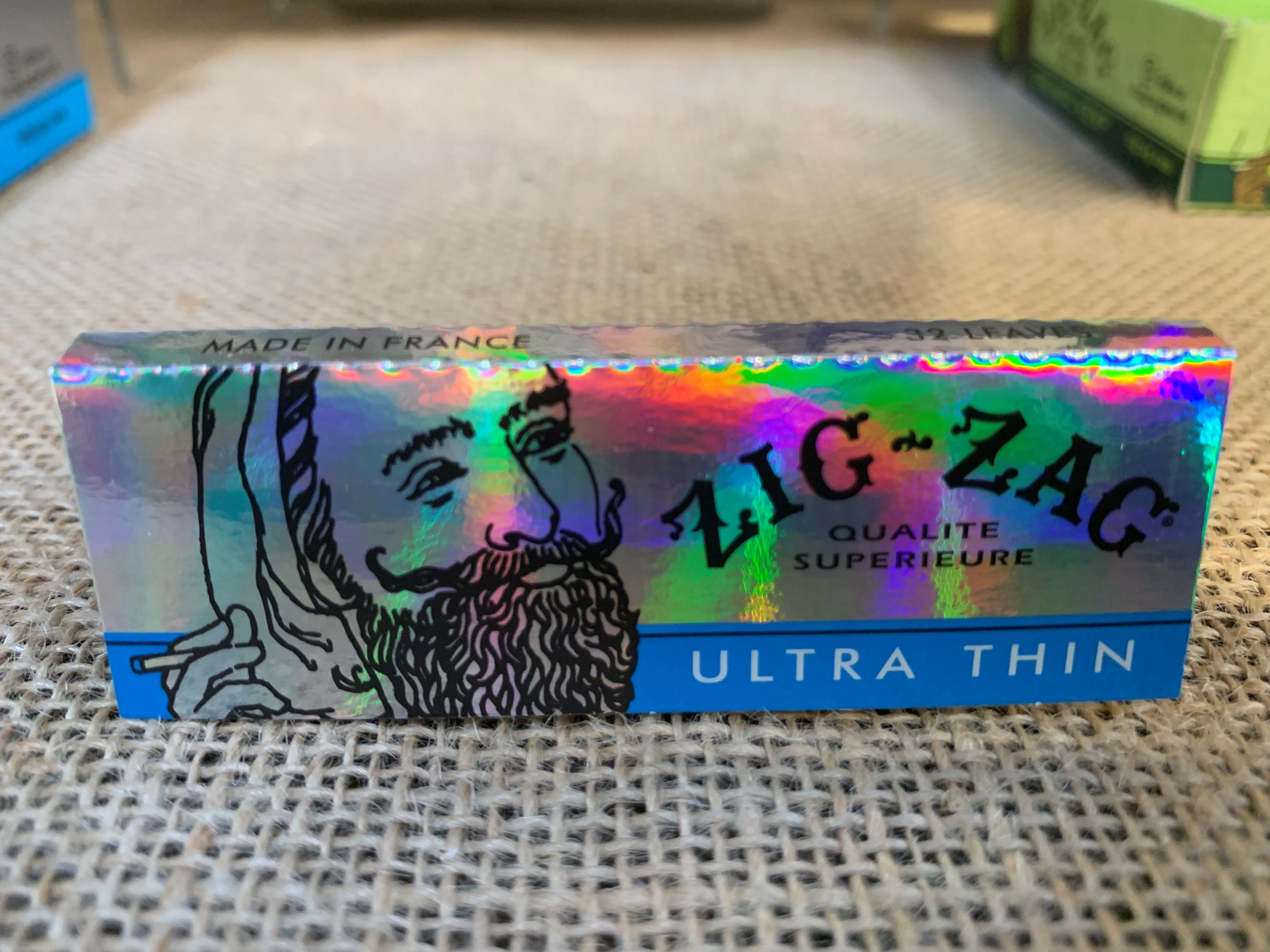 Photograph of product: WYN - $3 Zig-Zag Ultra Thin 1 1/4 Rolling Papers