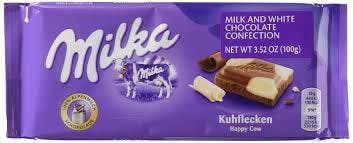 Photograph of product: Convenience Products | - Candy | Milka Chocolate | Happy Cow Spots