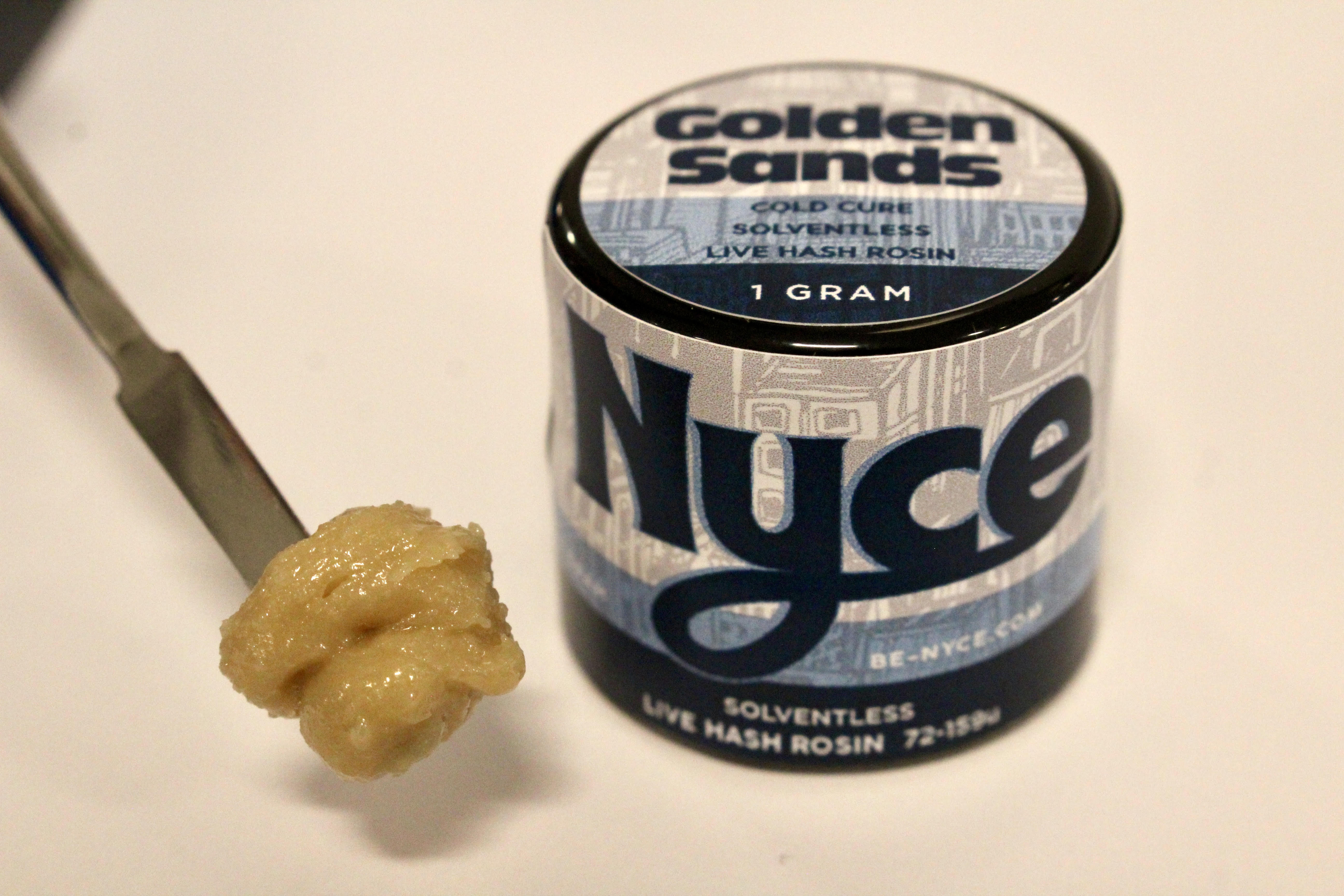 Photograph of product: Nyce: Golden Sands Solventless Cold Cure Live au chocolat Rosin
