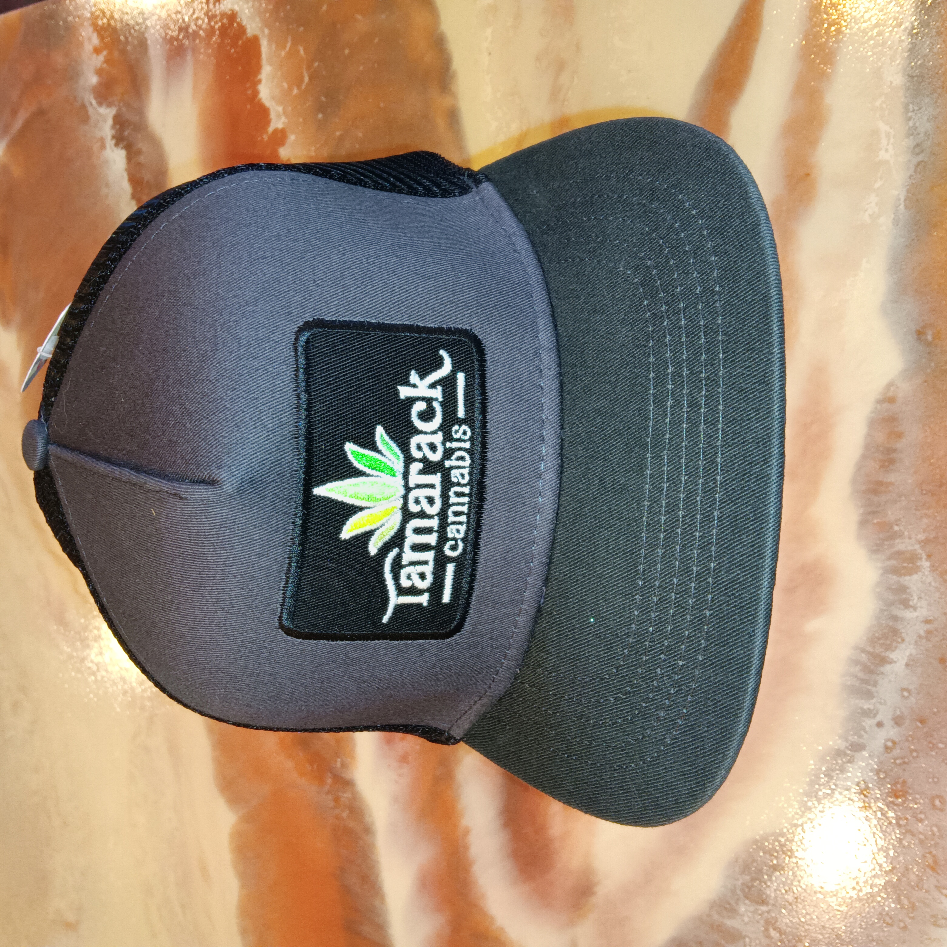 Photograph of Product: Hat - Ball Cap - Gray Cap w/Black Patch $25