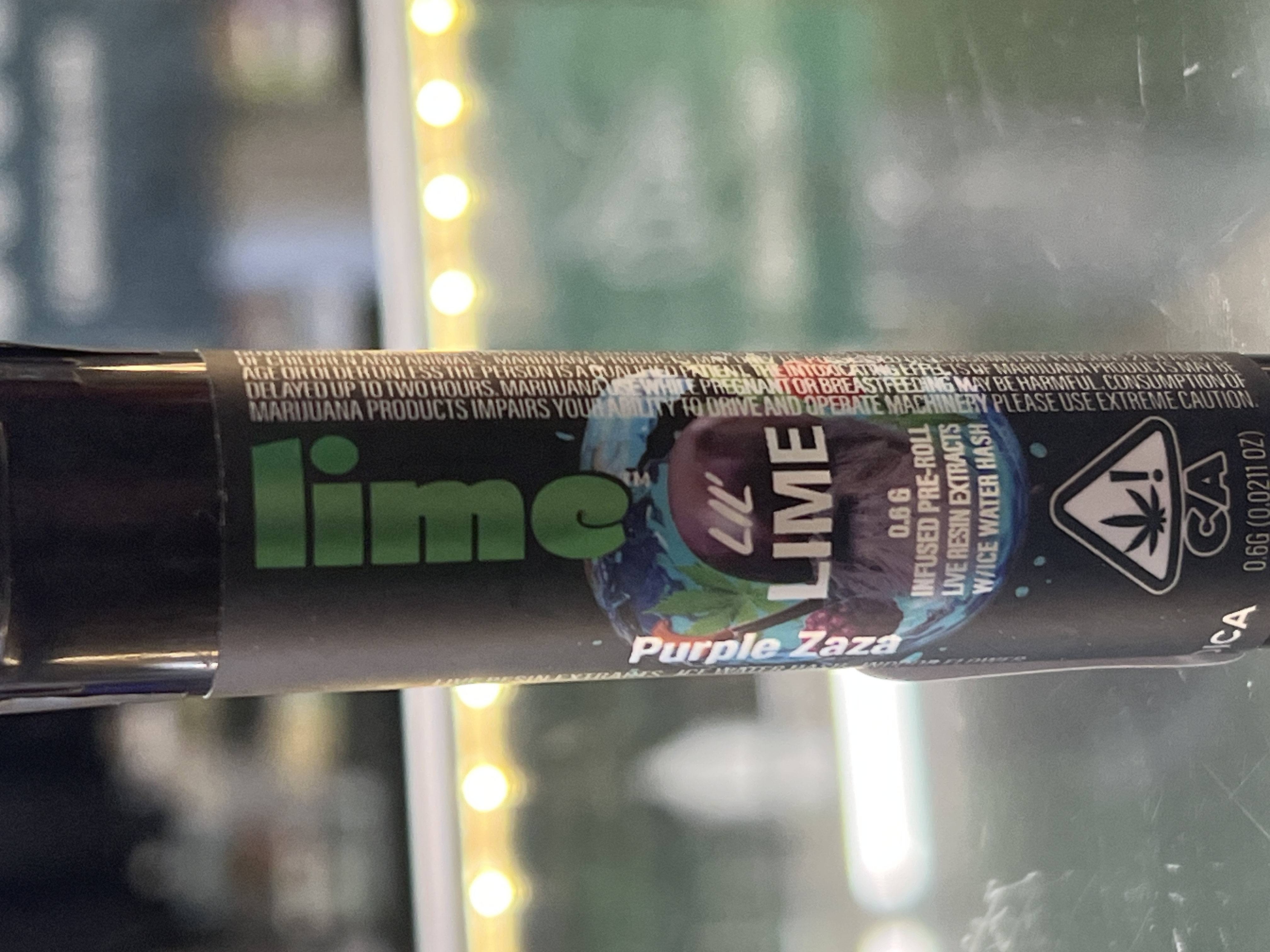 Photograph of product: Lime-Purple ZaZa Live Resin & au chocolat Infused .6g Pre Roll