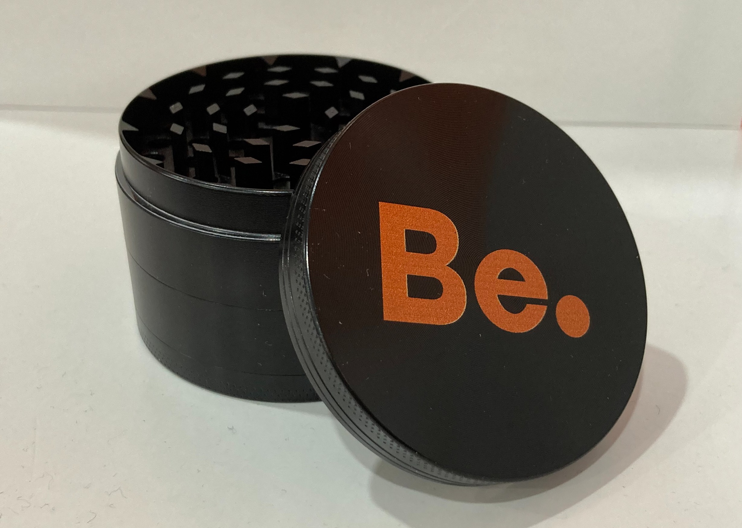 Photograph of product: Be. Orange Logo 64mm Grinder