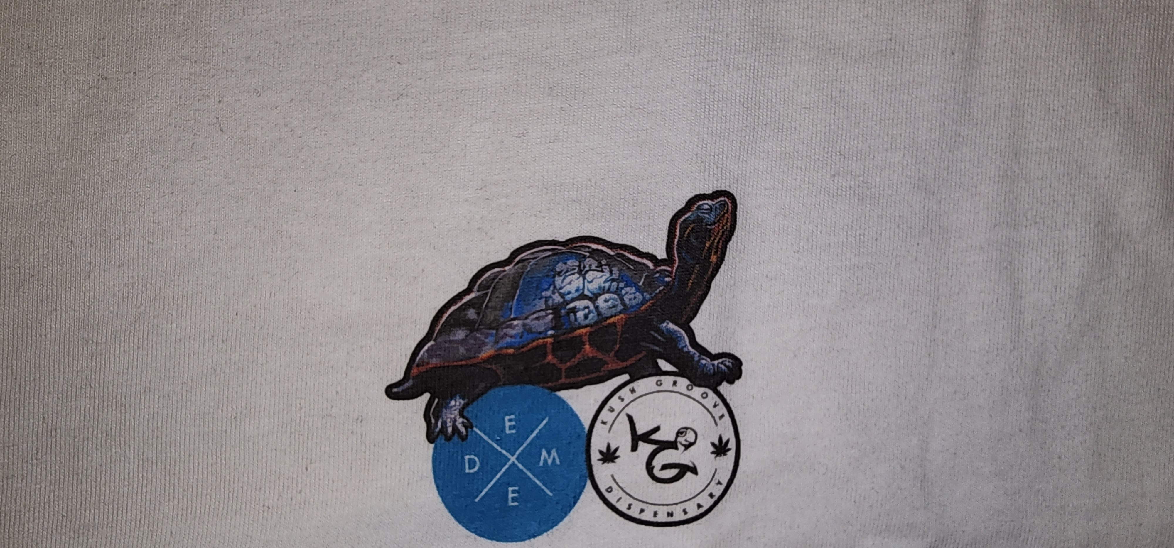 Photograph of product: Kush Groove I KG x DEME5 I T-Shirt - $35