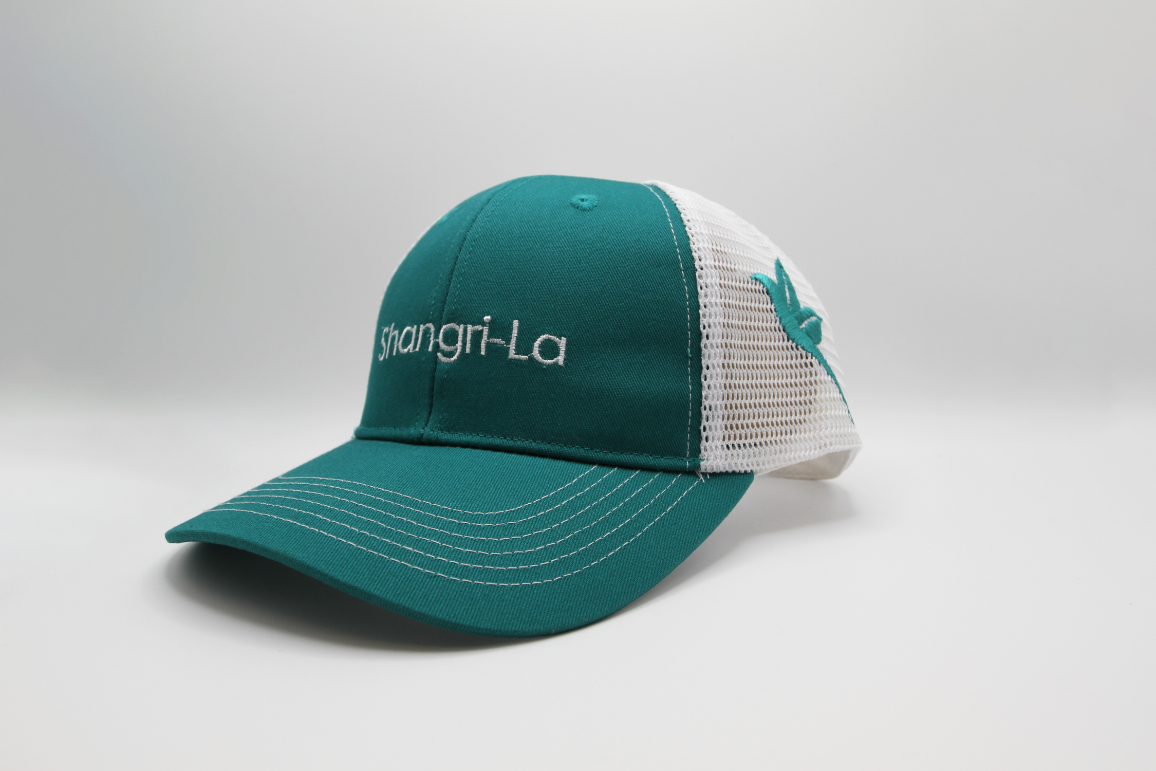Photograph of product: Shangri-La Teal/White Trucker Hat